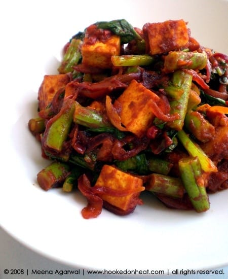Recipe for Chilli Tofu with Beans & Bok Choy taken from www.hookedonheat.com. Visit site for detailed recipe.