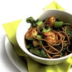 Recipe for Honey-Garlic Noodles with Shrimp & Greens taken from www.hookedonheat.com. Visit site for detailed recipe.