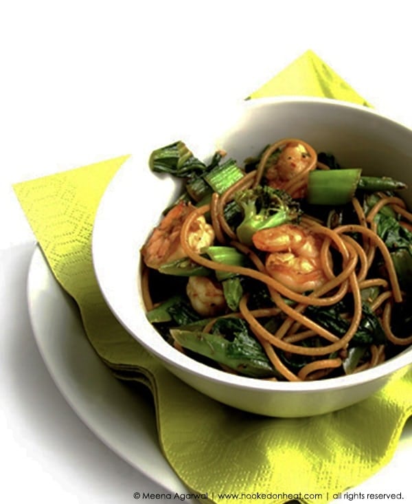 Recipe for Honey-Garlic Noodles with Shrimp & Greens taken from www.hookedonheat.com. Visit site for detailed recipe.