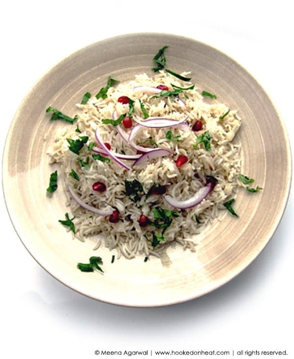 Recipe for Jeera Pulao (Cumin Pilaf) taken from www.hookedonheat.com. Visit site for detailed recipe.