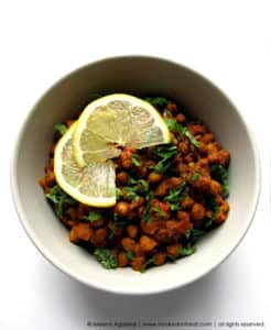 Recipe for Sukhe Kaale Chane (Sauteed Brown Chickpeas) taken from www.hookedonheat.com. Visit site for detailed recipe.