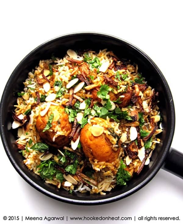 Recipe for Egg Biryani, taken from www.hookedonheat.com. Visit site for detailed recipe.