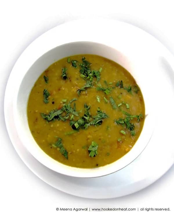 Recipe for Panch Phoron Dal taken from www.hookedonheat.com. Visit site for detailed recipe.