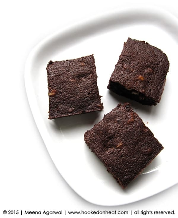Recipe for Walnut Brownies, taken from www.hookedonheat.com. Visit site for detailed recipe.