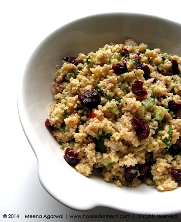 Recipe for Cranberry Cous Cous Salad taken from www.hookedonheat.com. Visit site for detailed recipe.