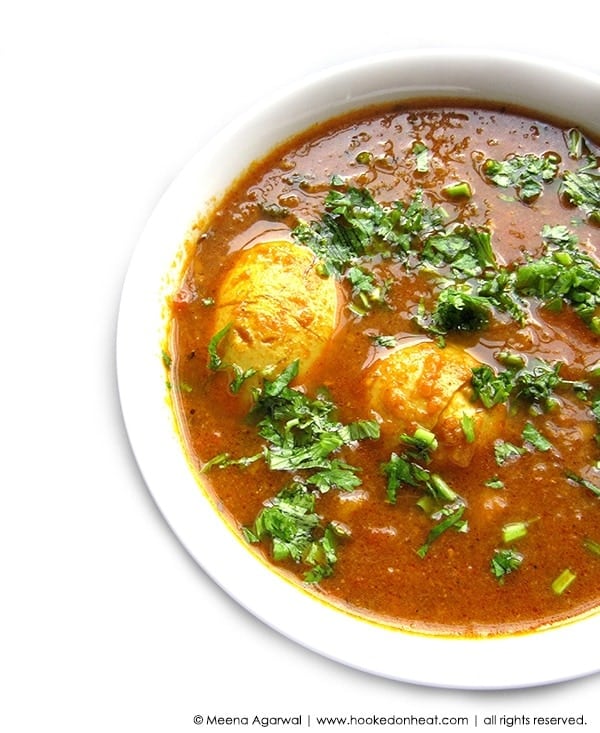 Recipe for Simple Egg Curry, taken from www.hookedonheat.com. Visit site for detailed recipe.