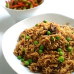 Recipe for Mushroom & Peas Pulao taken from www.hookedonheat.com. Visit site for detailed recipe.