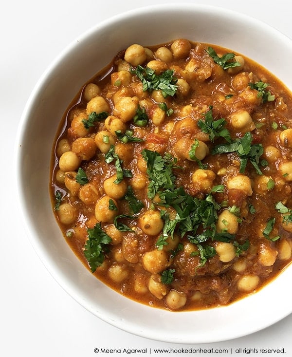Recipe for Chana Masala (Chickpea Curry), taken from www.hookedonheat.com. Visit site for detailed recipe.