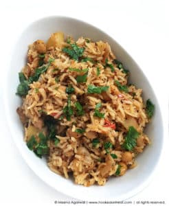 Recipe for Potato & Chickpea Rice taken from www.hookedonheat.com. Visit site for detailed recipe.