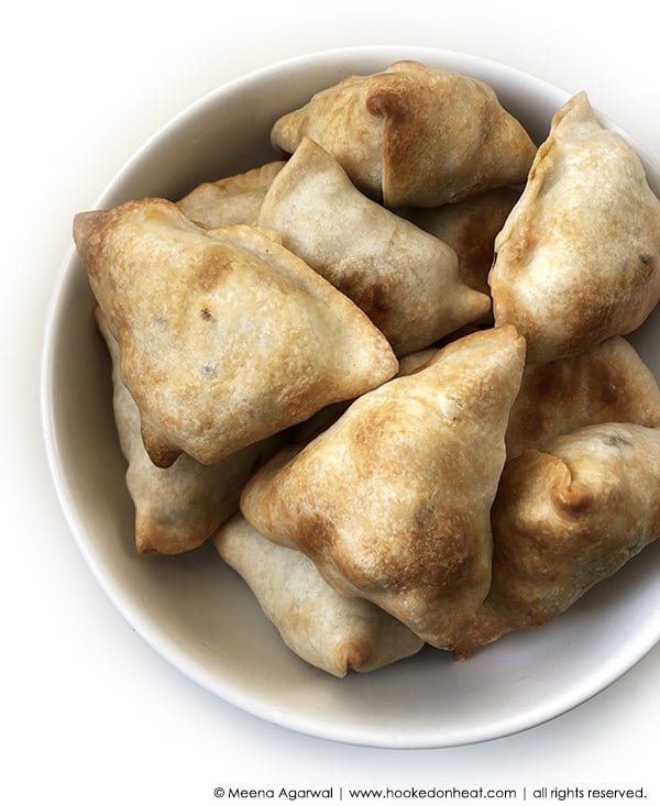 Recipe for Baked Samosas taken from www.hookedonheat.com. Visit site for detailed recipe.