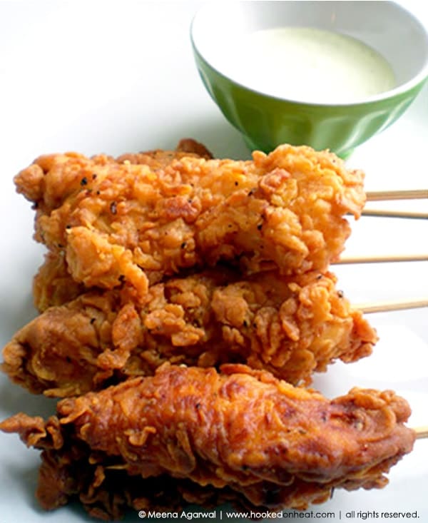 A platter of Tandoori Chicken Pops on sticks