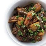 Recipe for Aloo Baingan (Potato & Eggplant Stir-fry) taken from www.hookedonheat.com. Visit site for detailed recipe.