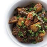 A bowl of Aloo Baingan (Potato & Eggplant Stir-fry)