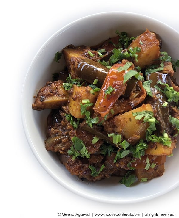 A bowl of Aloo Baingan (Potato & Eggplant Stir-fry)