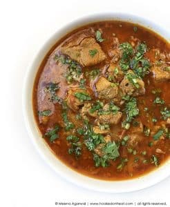 Recipe for Achari Gosht (Hot & Sour Lamb Curry) taken from www.hookedonheat.com. Visit site for detailed recipe.