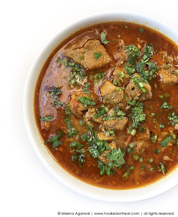 A bowl of Achari Gosht (Hot & Sour Lamb Curry)