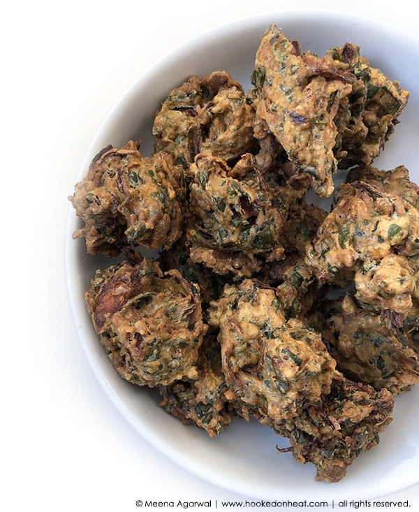 Recipe for Palak Pakodas (Spinach Fritters) taken from www.hookedonheat.com. Visit site for detailed recipe.