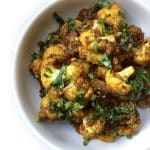 Recipe for Achari Gobhi (Spiced Cauliflower - Indian-style) taken from www.hookedonheat.com. Visit site for detailed recipe.