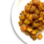 A bowl Jeera Aloo (Potatoes with Cumin).