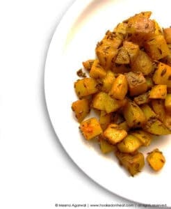 A bowl Jeera Aloo (Potatoes with Cumin).